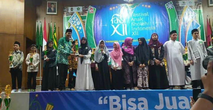 CHAMILA SYAQIB NURKIRANA, PENERIMA BEASISWA KADER HAFIDZ BAZNAS KOTA YOGYAKARTA RAIH JUARA 1 TILAWAH PUTRI FESTIVAL ANAK SHOLEH INDONESIA (FASI) XII